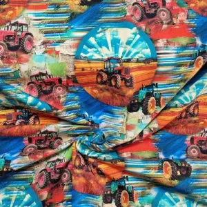 Tricotstof met tractor print in de ochtendgloren De leukste boerenstoffen Bij Makomastoffen Holland