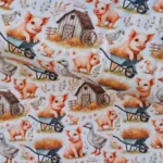 Tricotstof boerderijprint met roodbonte varkentjes in kruiwagen Koop uw stof online bij Makomastoffen Drenthe