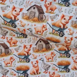 Tricotstof boerderijprint met roodbonte varkentjes in kruiwagen Koop uw stof online bij Makomastoffen Drenthe