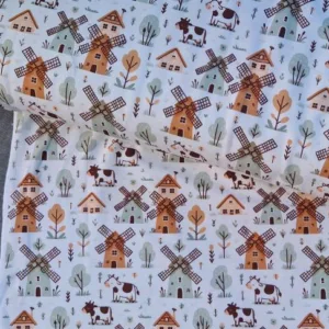 Tricot boerderij stof met koeien molens en boerderijprint Bestel online Bij Makomastoffen Weesp