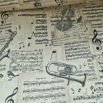 Vintage print van muziekinstrumenten muzieknoten Stoffen bestellen stoffenwebwinkel online Makomastoffen