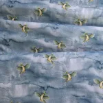 Draken tricot stof drakenprint op mistige lucht ideaal voor kinderkleding Bij makomastoffen online stoffenwinkel Groningen