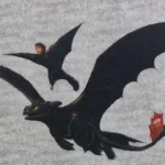 Tricot stof met draken voor kinderkleding Stoffenwebwinkel Makomastoffen