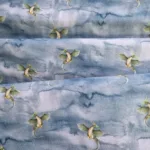 Tricotstof met drakenprint Stoffen web winkel Makomastoffen Stadskanaal