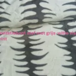 Zachte imitatiebont stof met grijs‑witte visgraat dierenprint