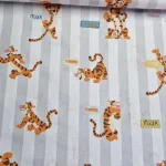 Tijgetje katoenstof met vrolijke tijgetje print Kinderbaby kamer stoffenwebwinkel makomastoffen online Gouda