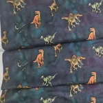Dinosaurussen tricotstof met prehistorische dierenprint Makomastoffen