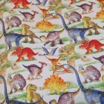 Katoen stof met dino’s in kleurrijke kinderprint kopen De stoffenwebwinkel online Barendrecht