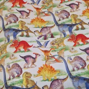 Katoen stof met dino’s in kleurrijke kinderprint kopen De stoffenwebwinkel online Barendrecht