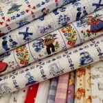 Oudhollandse tegeltjes katoenstof met klassieke Hollandse motieven